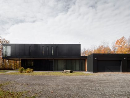 An Elegant Bi-Generational Family Cottage on a Large Wooded Lot near Sutton, Quebec