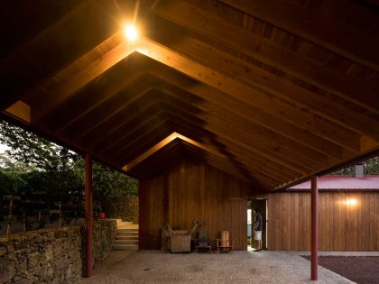 A Bright Contemporary Red Home Consists of Two Volumes Connected by a Wide Corridor in Ponta Delgada by Pedro Mauricio Borges (19)