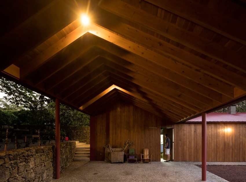 A Bright Contemporary Red Home Consists of Two Volumes Connected by a Wide Corridor in Ponta Delgada by Pedro Mauricio Borges (19)