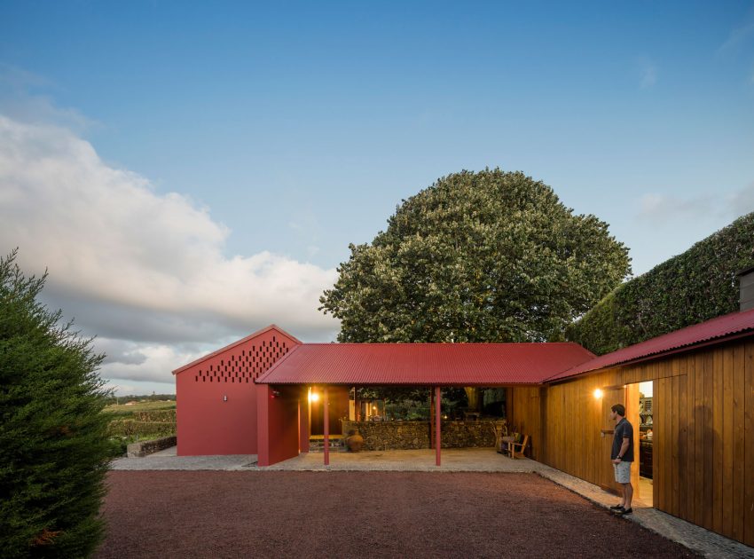 A Bright Contemporary Red Home Consists of Two Volumes Connected by a Wide Corridor in Ponta Delgada by Pedro Mauricio Borges (20)