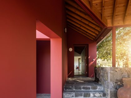 A Bright Contemporary Red Home Consists of Two Volumes Connected by a Wide Corridor in Ponta Delgada by Pedro Mauricio Borges (8)