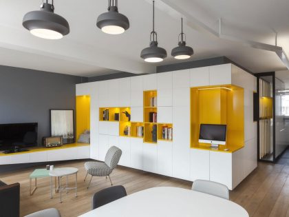 A Cheerful Apartment in Blue, Yellow and White for a Father and Son in Paris