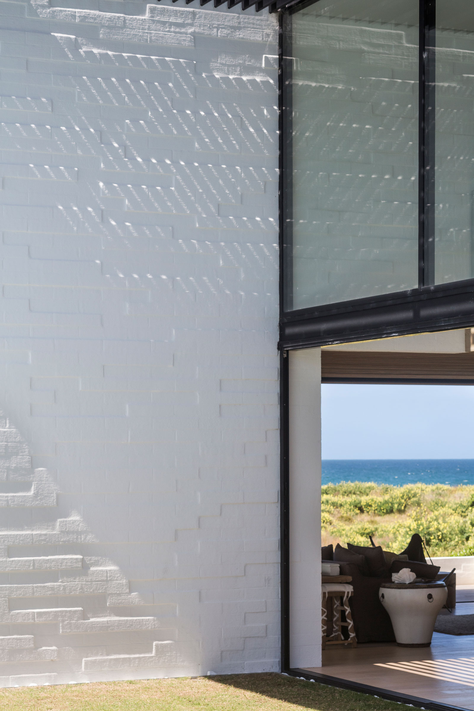 A Contemporary Family Home Greeted by a Double Height Entryway in Omaha, New Zealand by Julian Guthrie (10)