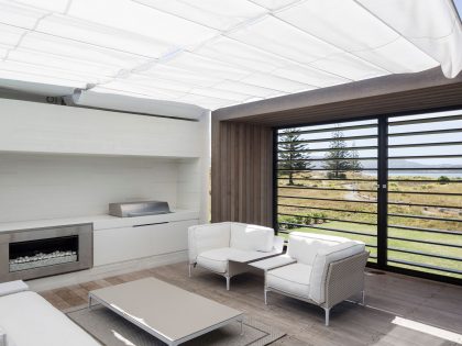 A Contemporary Family Home Greeted by a Double Height Entryway in Omaha, New Zealand by Julian Guthrie (11)