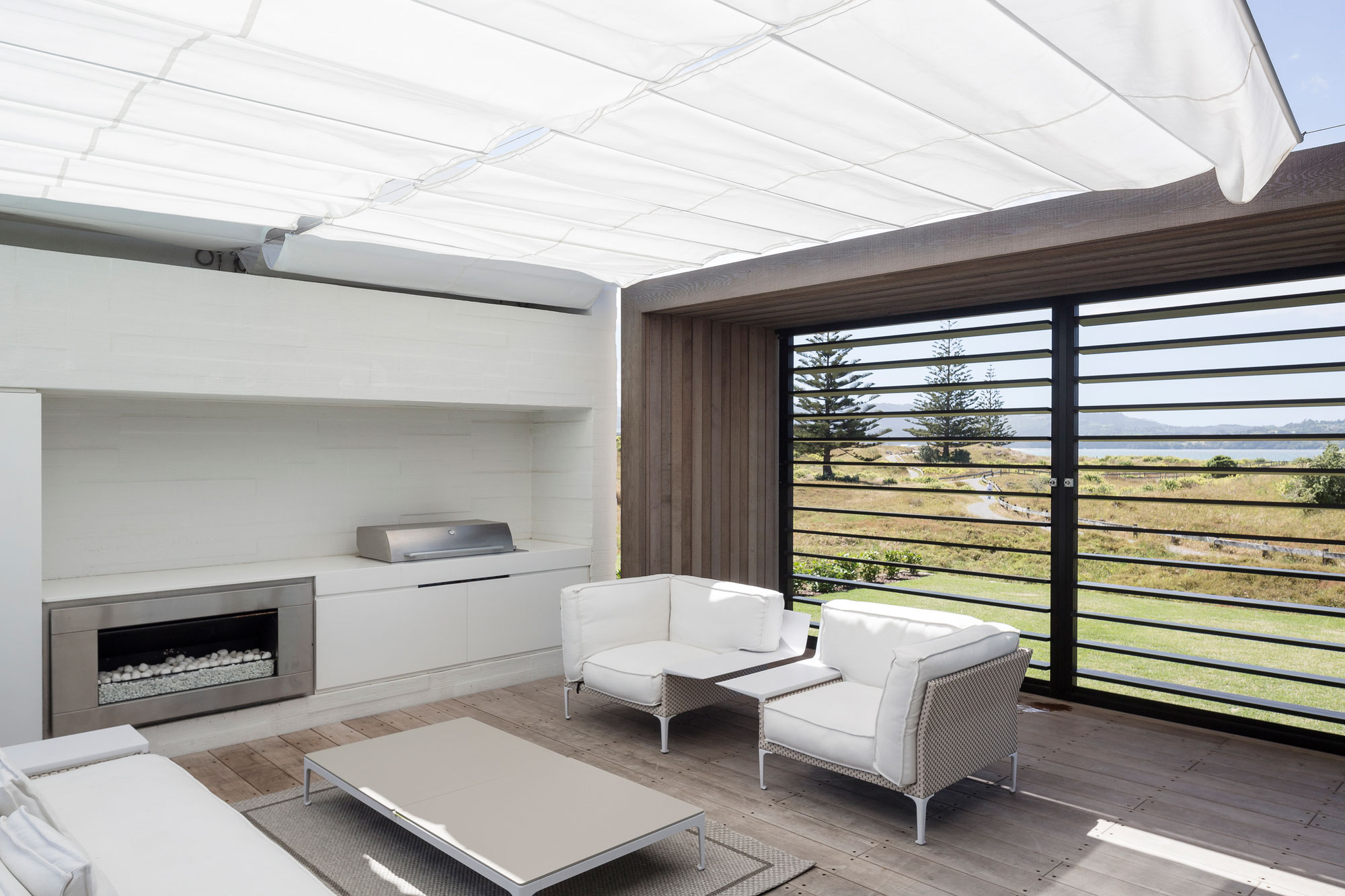 A Contemporary Family Home Greeted by a Double Height Entryway in Omaha, New Zealand by Julian Guthrie (11)