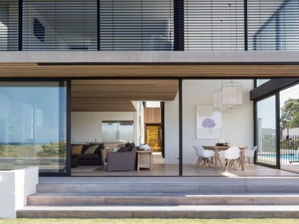 A Contemporary Family Home Greeted by a Double Height Entryway in Omaha, New Zealand by Julian Guthrie (12)