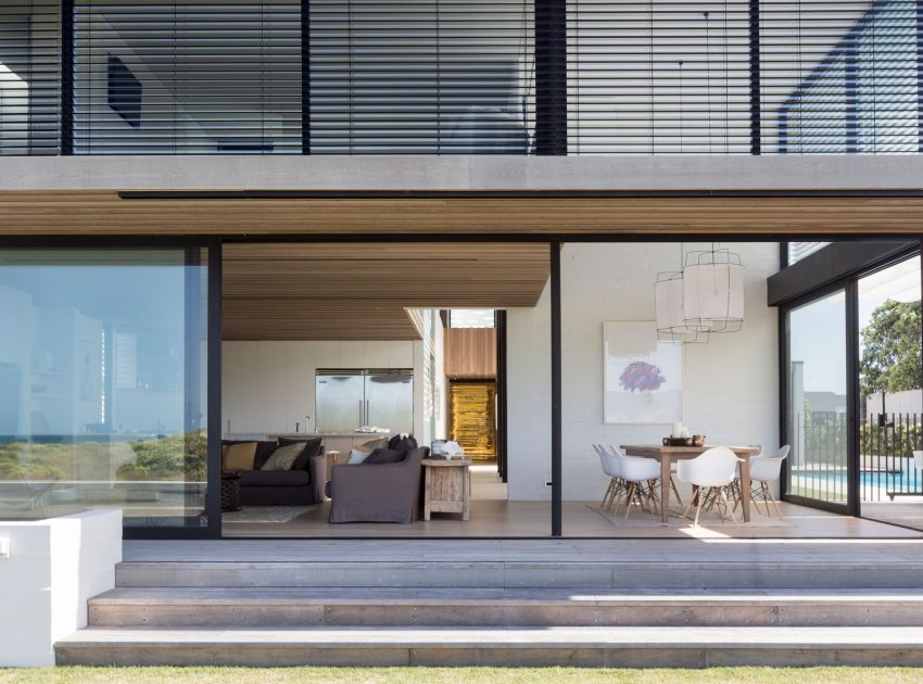 A Contemporary Family Home Greeted by a Double Height Entryway in Omaha, New Zealand by Julian Guthrie (12)