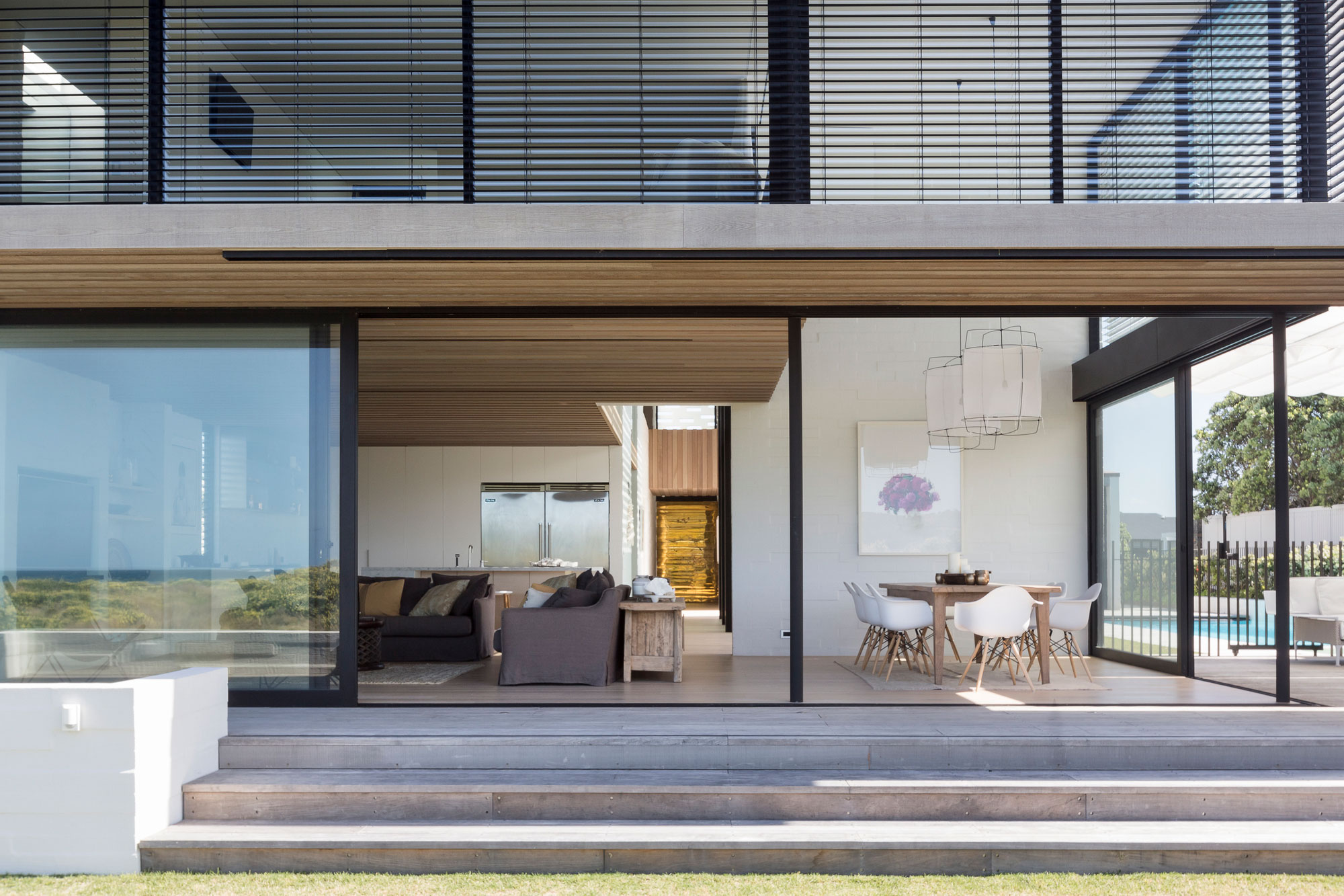 A Contemporary Family Home Greeted by a Double Height Entryway in Omaha, New Zealand by Julian Guthrie (12)