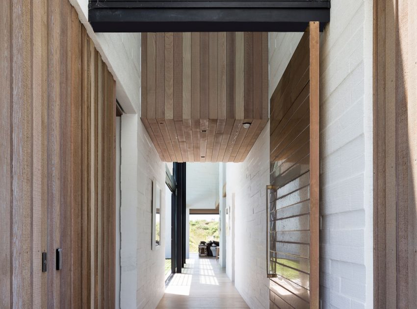 A Contemporary Family Home Greeted by a Double Height Entryway in Omaha, New Zealand by Julian Guthrie (15)