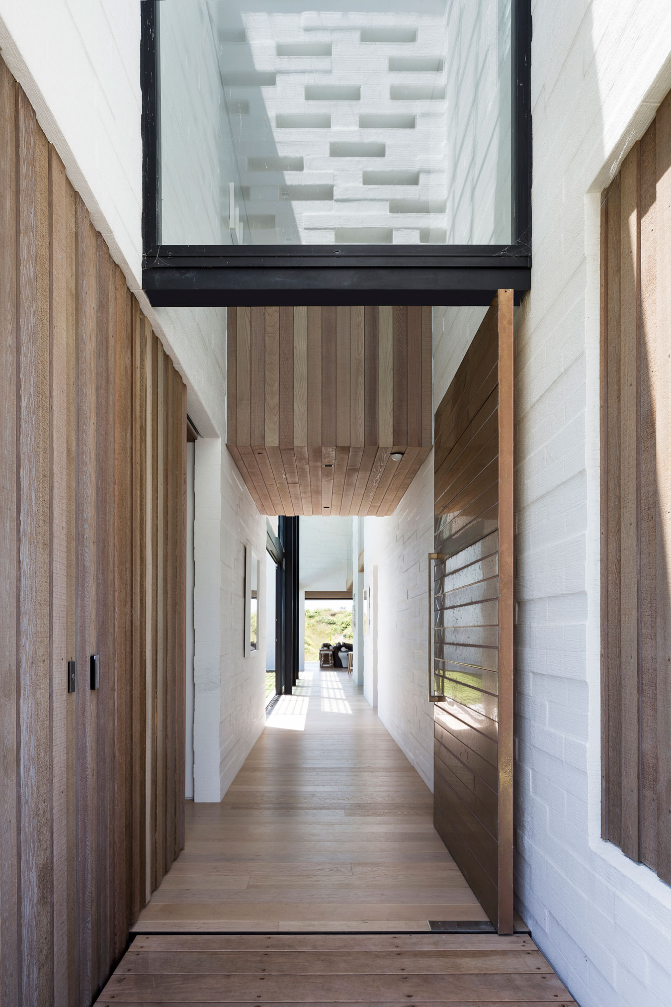 A Contemporary Family Home Greeted by a Double Height Entryway in Omaha, New Zealand by Julian Guthrie (15)