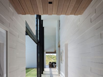 A Contemporary Family Home Greeted by a Double Height Entryway in Omaha, New Zealand by Julian Guthrie (16)