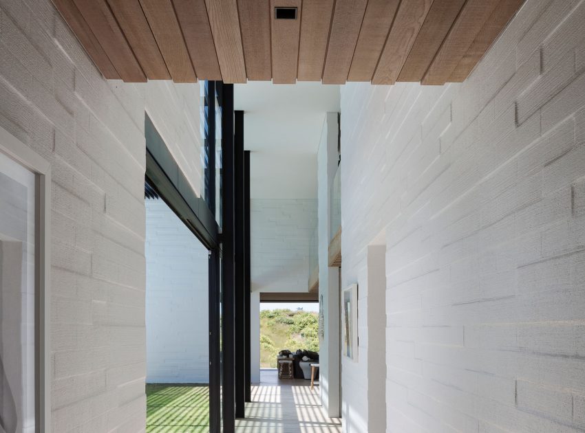 A Contemporary Family Home Greeted by a Double Height Entryway in Omaha, New Zealand by Julian Guthrie (16)