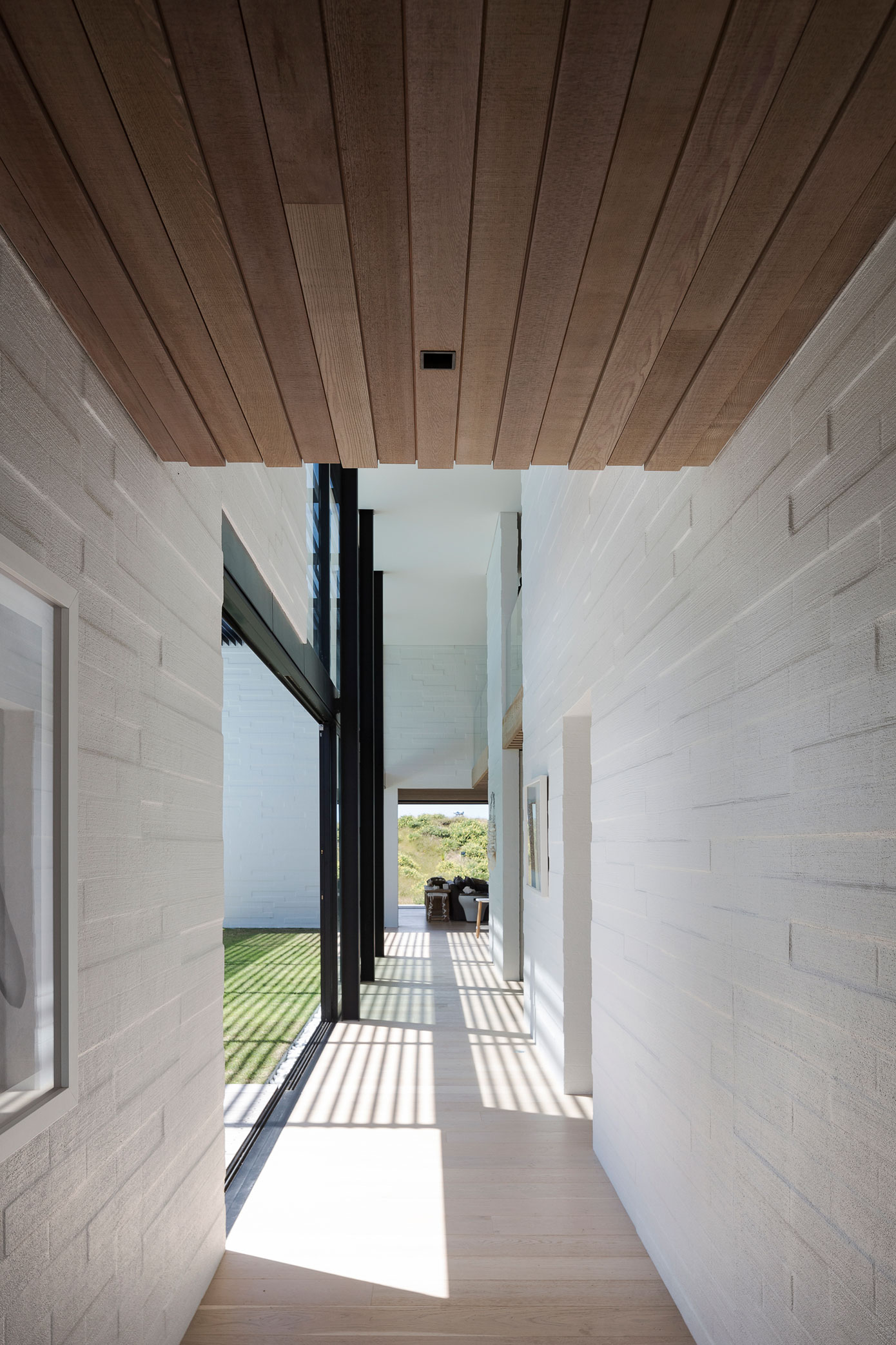 A Contemporary Family Home Greeted by a Double Height Entryway in Omaha, New Zealand by Julian Guthrie (16)
