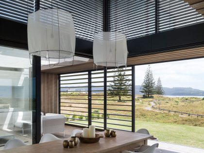 A Contemporary Family Home Greeted by a Double Height Entryway in Omaha, New Zealand by Julian Guthrie (19)