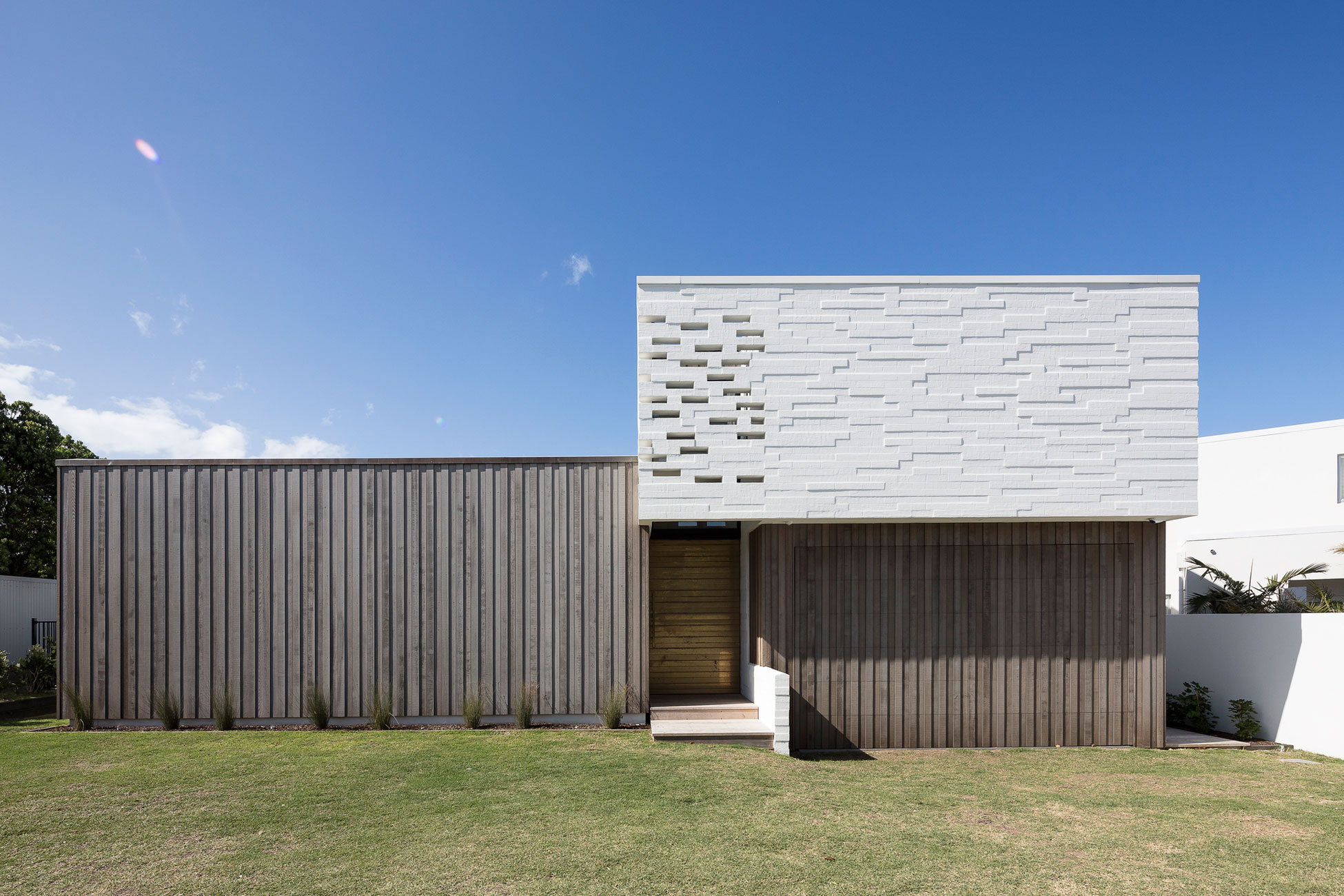 A Contemporary Family Home Greeted by a Double Height Entryway in Omaha, New Zealand by Julian Guthrie (2)