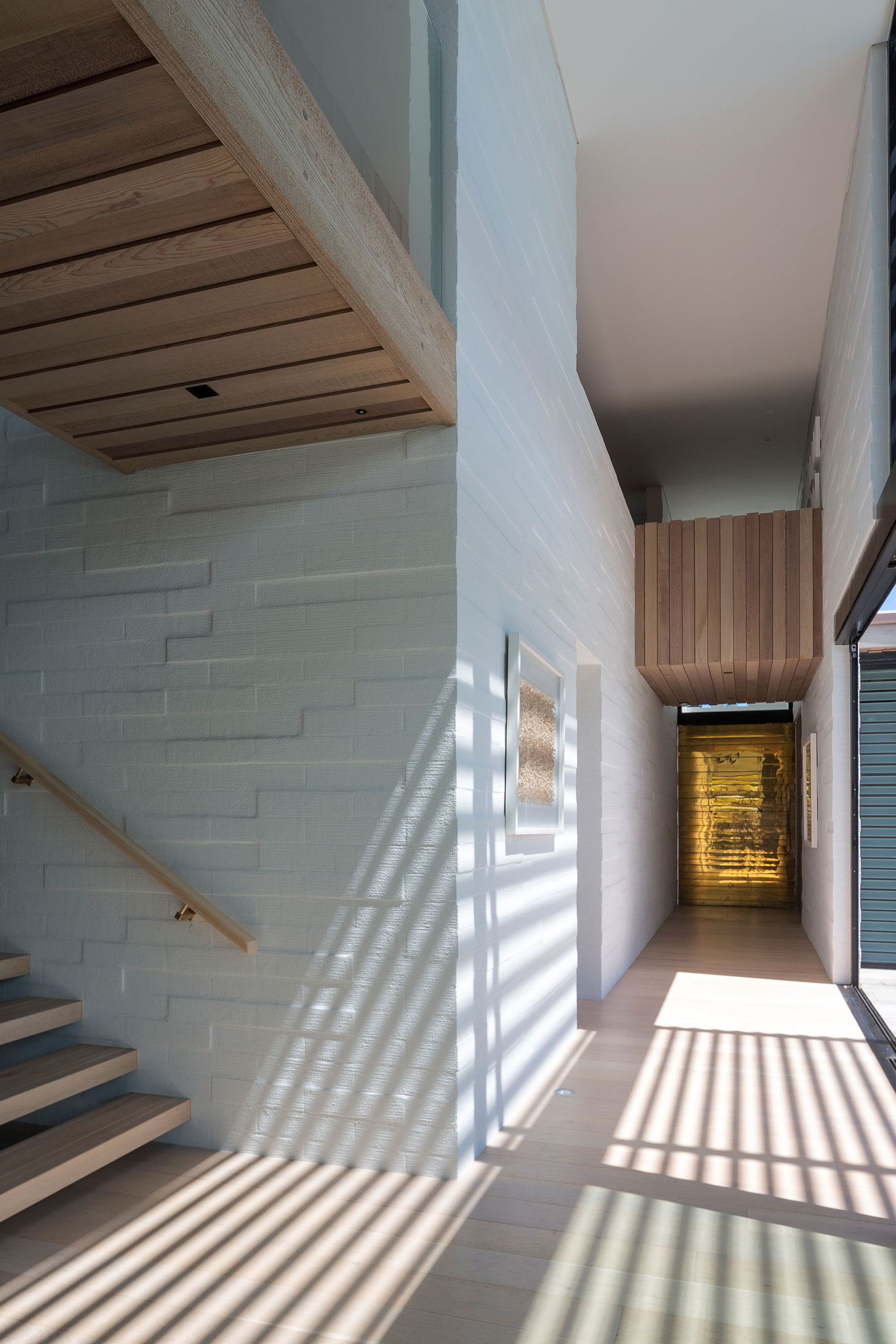 A Contemporary Family Home Greeted by a Double Height Entryway in Omaha, New Zealand by Julian Guthrie (20)