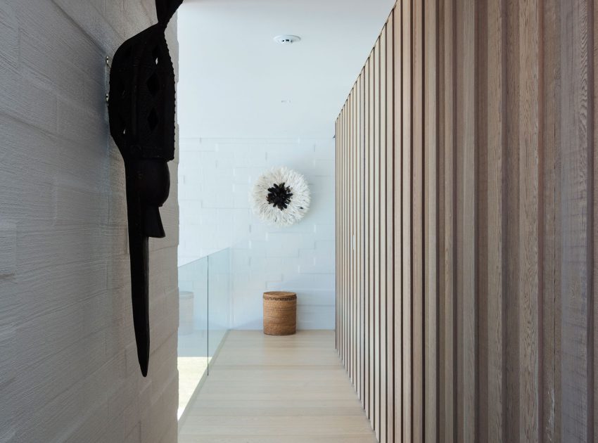 A Contemporary Family Home Greeted by a Double Height Entryway in Omaha, New Zealand by Julian Guthrie (22)