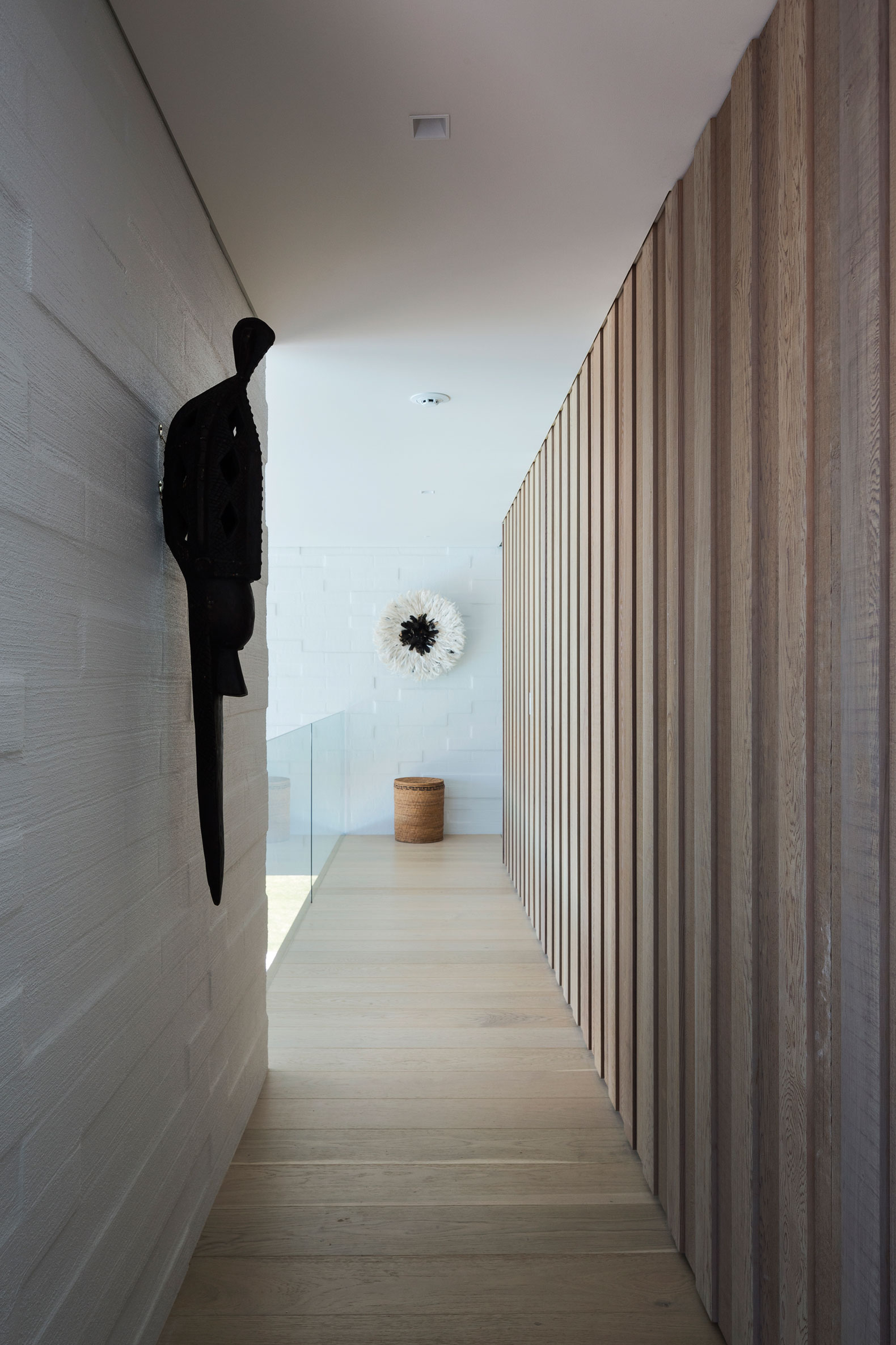 A Contemporary Family Home Greeted by a Double Height Entryway in Omaha, New Zealand by Julian Guthrie (22)