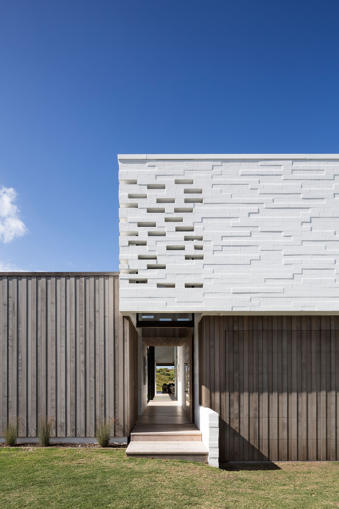 A Contemporary Family Home Greeted by a Double Height Entryway in Omaha, New Zealand by Julian Guthrie (3)
