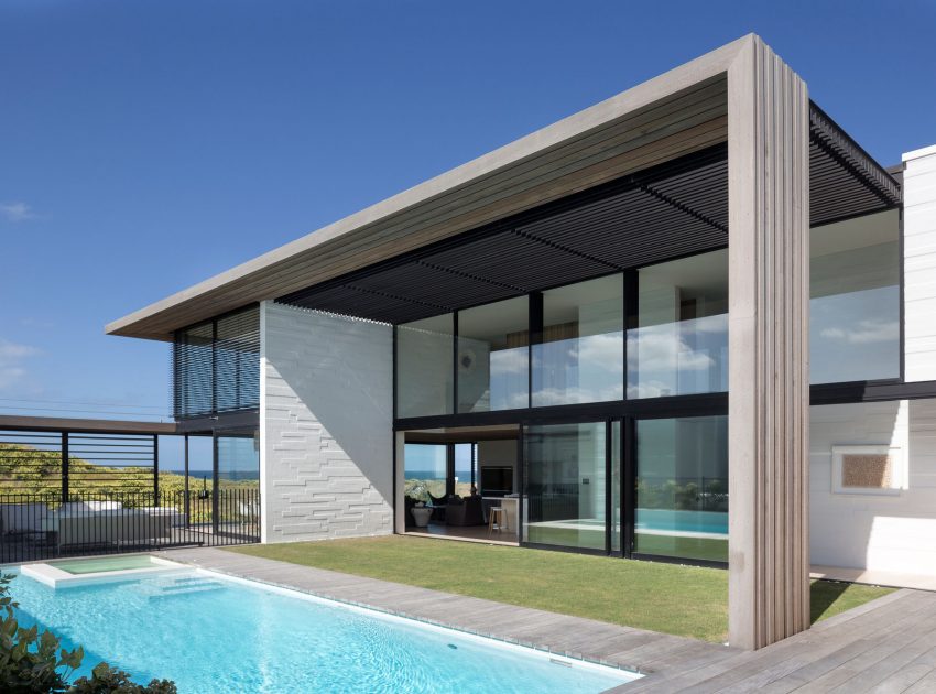 A Contemporary Family Home Greeted by a Double Height Entryway in Omaha, New Zealand by Julian Guthrie (5)