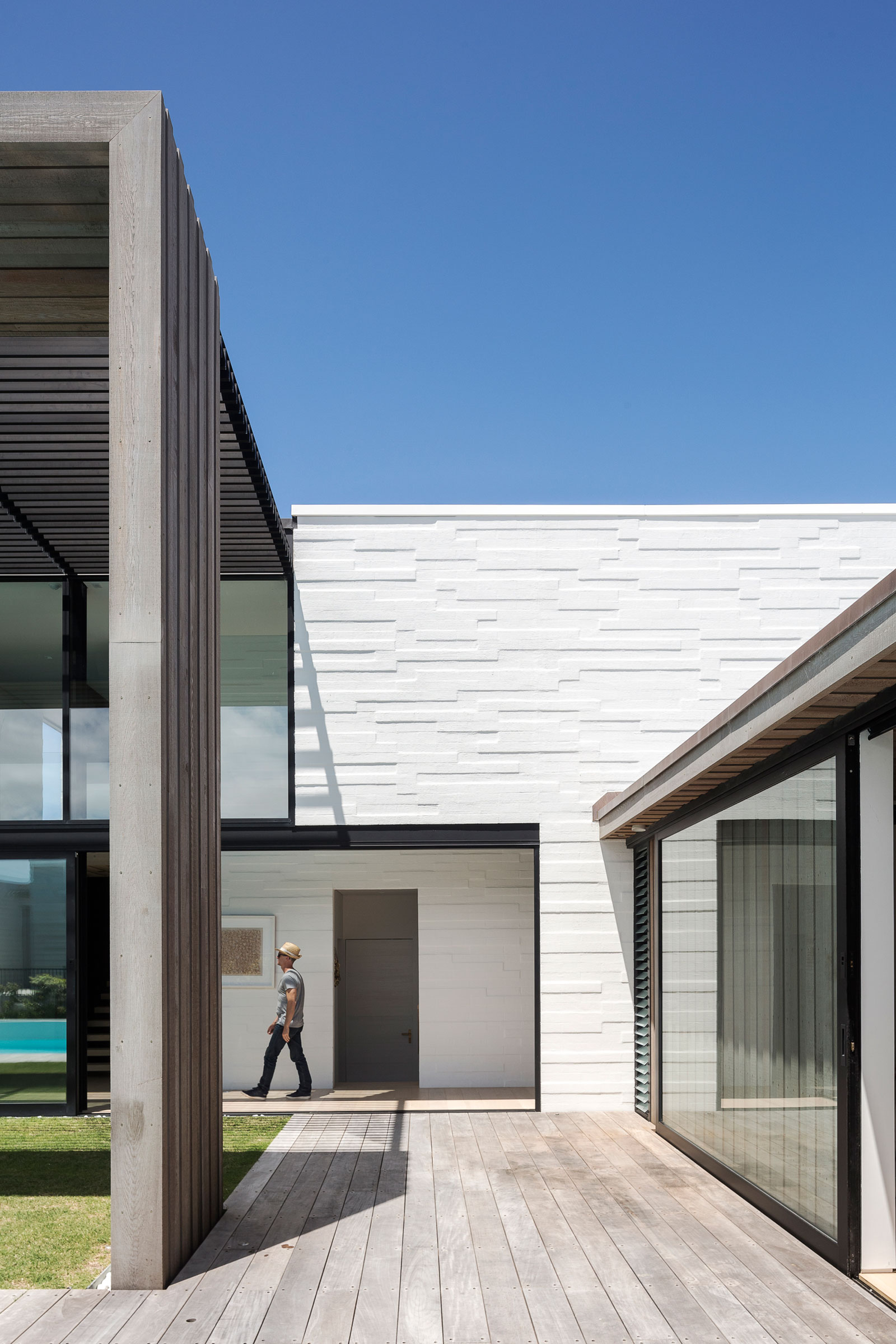 A Contemporary Family Home Greeted by a Double Height Entryway in Omaha, New Zealand by Julian Guthrie (6)