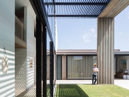 A Contemporary Family Home Greeted by a Double Height Entryway in Omaha, New Zealand by Julian Guthrie (8)