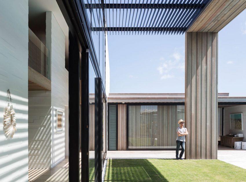 A Contemporary Family Home Greeted by a Double Height Entryway in Omaha, New Zealand by Julian Guthrie (8)