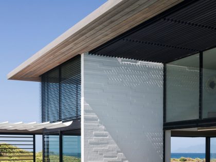 A Contemporary Family Home Greeted by a Double Height Entryway in Omaha, New Zealand by Julian Guthrie (9)