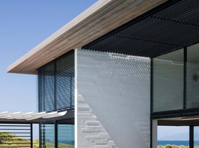 A Contemporary Family Home Greeted by a Double Height Entryway in Omaha, New Zealand by Julian Guthrie (9)