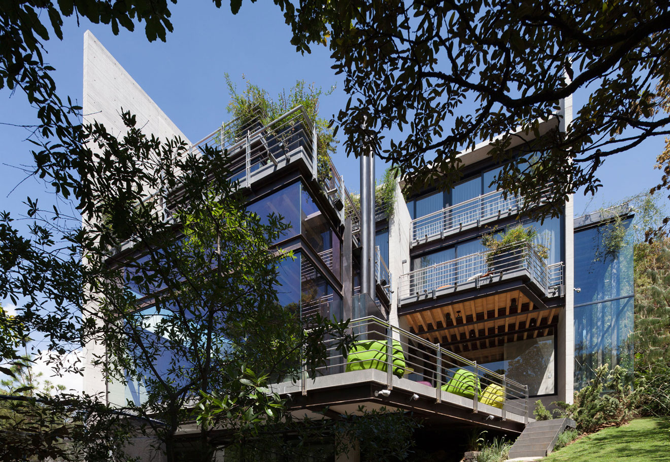 A Contemporary Glass Home Composed of Two Geometric Concrete Volumes in Mexico City by grupoarquitectura (1)