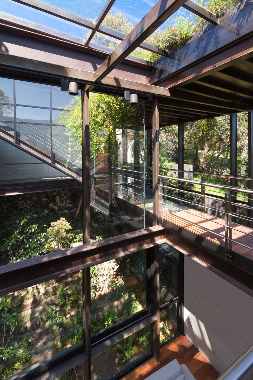 A Contemporary Glass Home Composed of Two Geometric Concrete Volumes in Mexico City by grupoarquitectura (10)