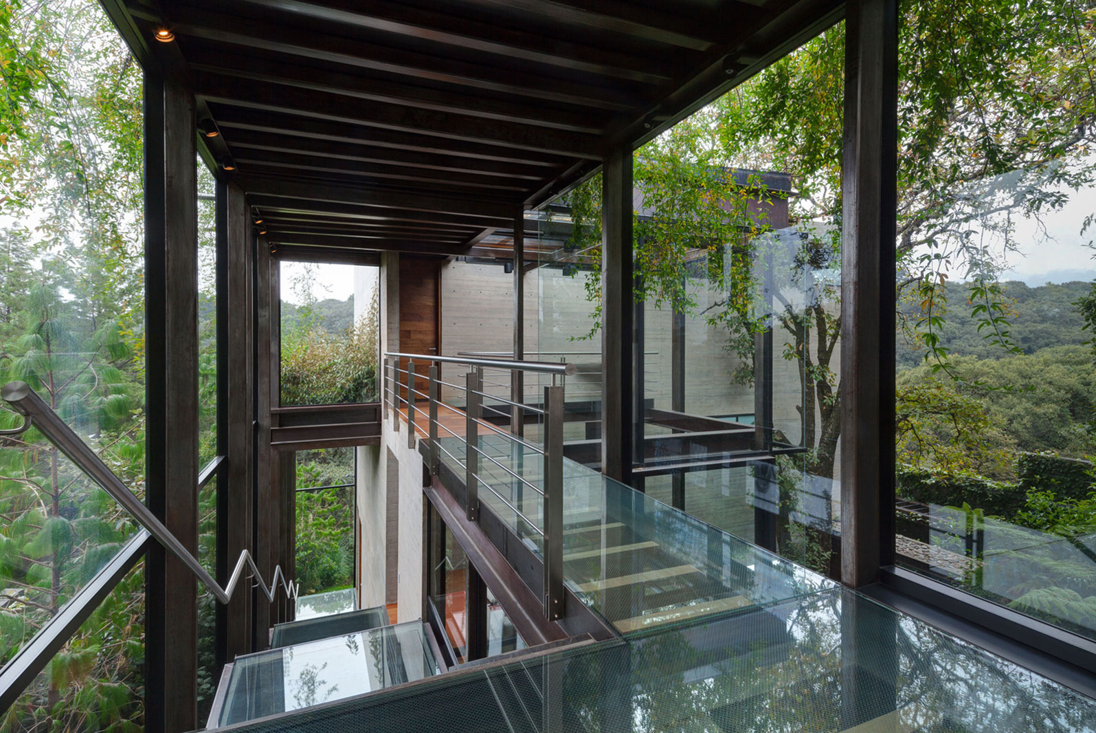 A Contemporary Glass Home Composed of Two Geometric Concrete Volumes in Mexico City by grupoarquitectura (12)
