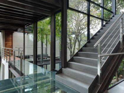 A Contemporary Glass Home Composed of Two Geometric Concrete Volumes in Mexico City by grupoarquitectura (13)