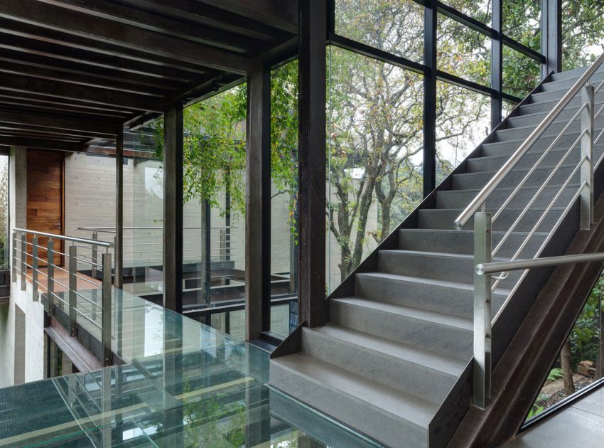 A Contemporary Glass Home Composed of Two Geometric Concrete Volumes in Mexico City by grupoarquitectura (13)