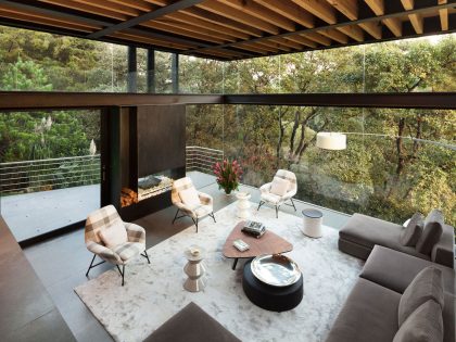 A Contemporary Glass Home Composed of Two Geometric Concrete Volumes in Mexico City by grupoarquitectura (15)