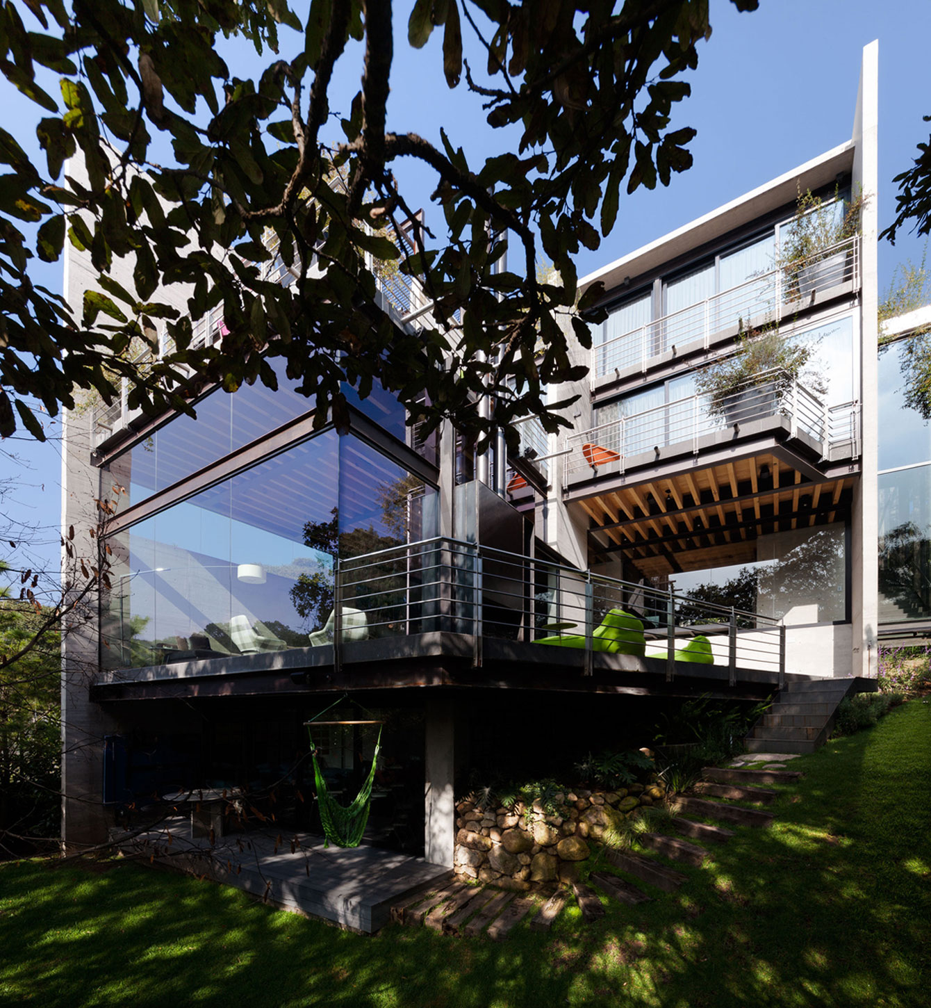 A Contemporary Glass Home Composed of Two Geometric Concrete Volumes in Mexico City by grupoarquitectura (2)