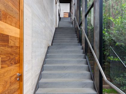 A Contemporary Glass Home Composed of Two Geometric Concrete Volumes in Mexico City by grupoarquitectura (21)