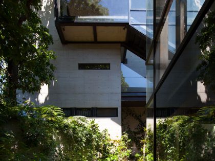 A Contemporary Glass Home Composed of Two Geometric Concrete Volumes in Mexico City by grupoarquitectura (5)