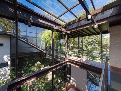 A Contemporary Glass Home Composed of Two Geometric Concrete Volumes in Mexico City by grupoarquitectura (8)