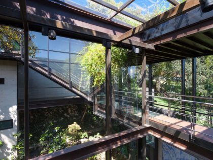 A Contemporary Glass Home Composed of Two Geometric Concrete Volumes in Mexico City by grupoarquitectura (9)
