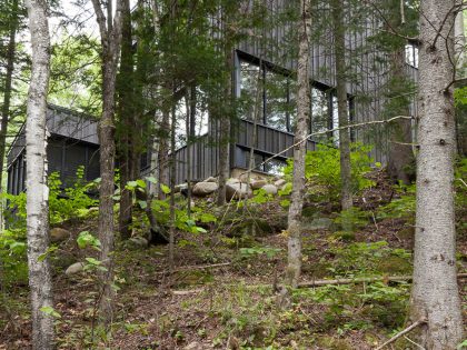 A Spacious Contemporary Home with Light-Filled Interiors in the Forests of Quebec by Nathalie Thibodeau Architecte (3)