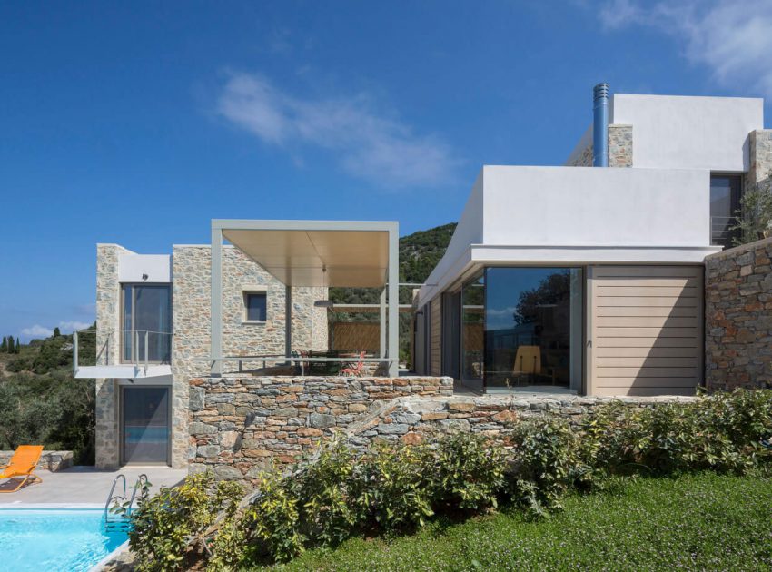 A Spacious Light-Filled Home with Stone Walls and Unique Style on Skiathos, Greece by HHH Architects (1)