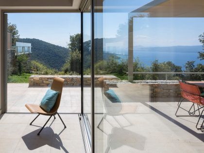 A Spacious Light-Filled Home with Stone Walls and Unique Style on Skiathos, Greece by HHH Architects (13)