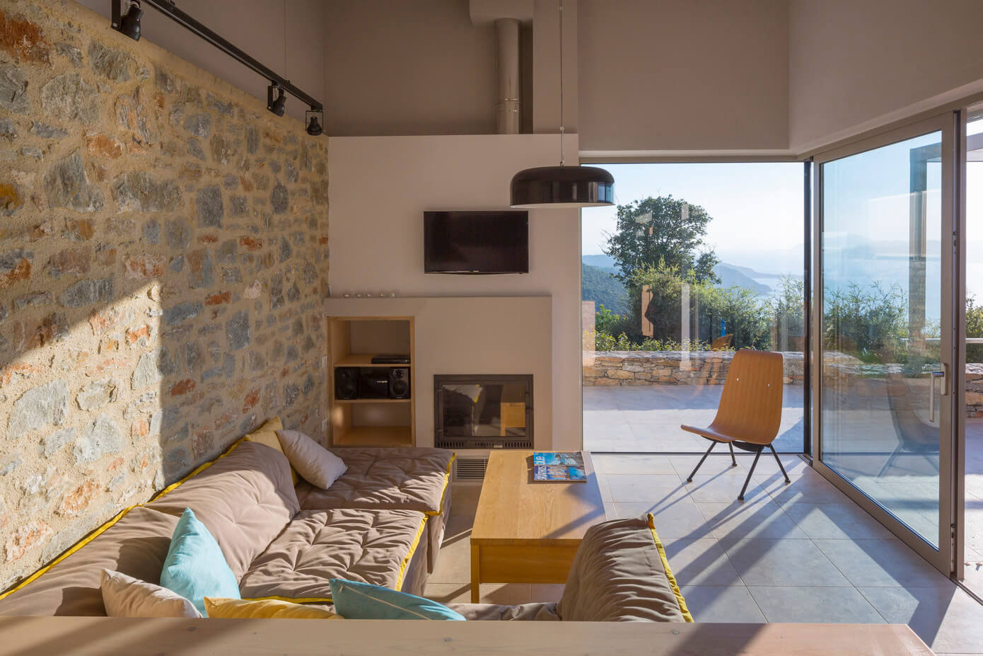 A Spacious Light-Filled Home with Stone Walls and Unique Style on Skiathos, Greece by HHH Architects (14)