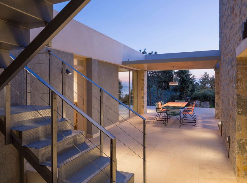 A Spacious Light-Filled Home with Stone Walls and Unique Style on Skiathos, Greece by HHH Architects (17)