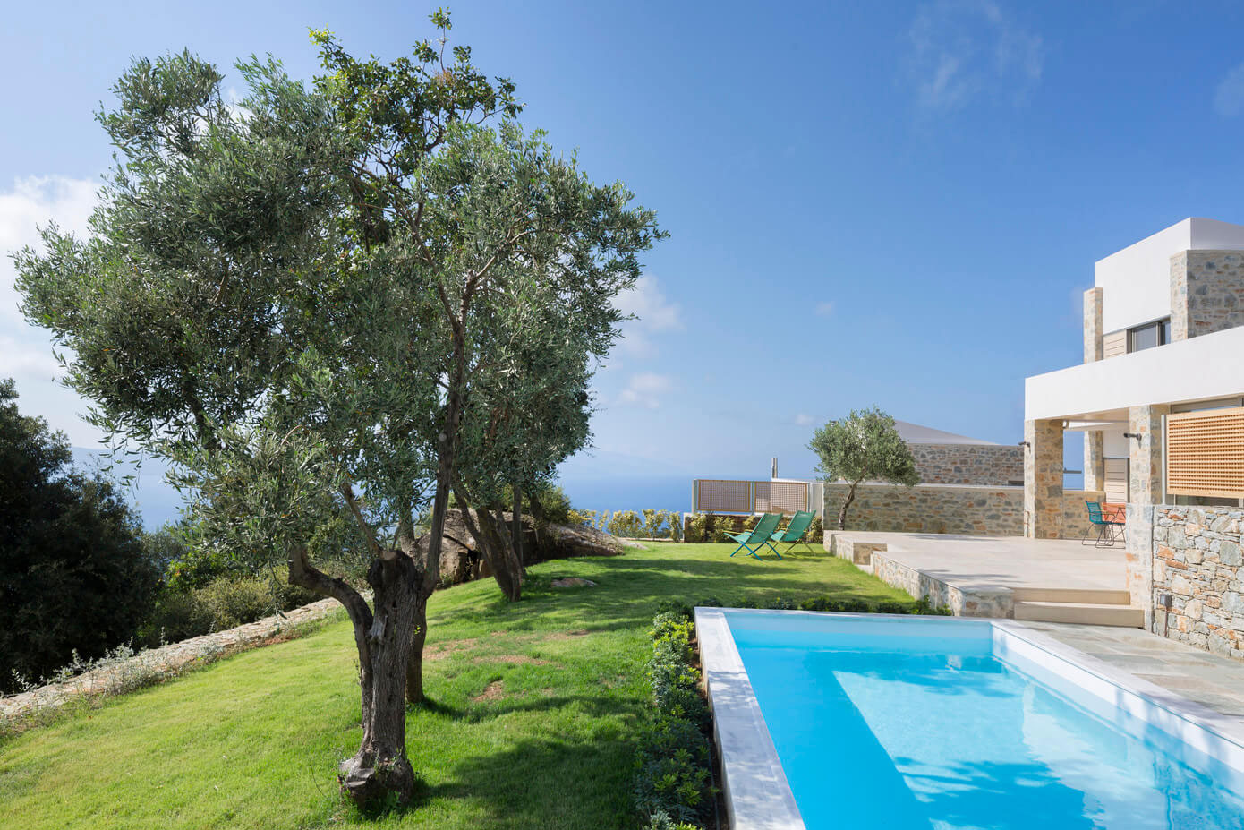 A Spacious Light-Filled Home with Stone Walls and Unique Style on Skiathos, Greece by HHH Architects (2)