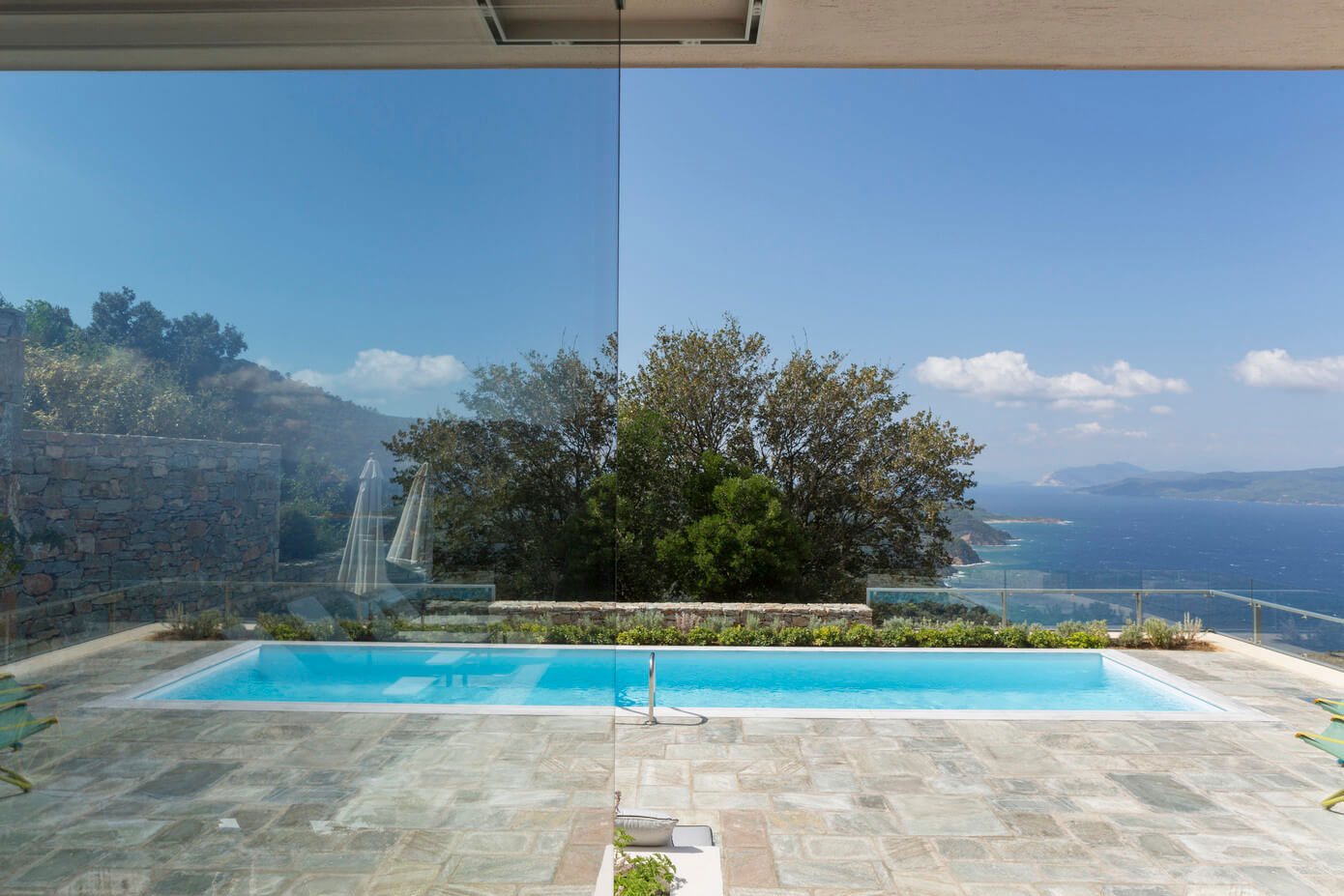 A Spacious Light-Filled Home with Stone Walls and Unique Style on Skiathos, Greece by HHH Architects (5)