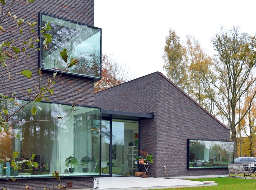 A Luminous House Divided in Two Separate Volumes Surrounded by Vast Green on Aalter, Belgium by Architektuurburo Dirk Hulpia (35)