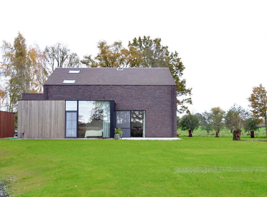 A Luminous House Divided in Two Separate Volumes Surrounded by Vast Green on Aalter, Belgium by Architektuurburo Dirk Hulpia (42)