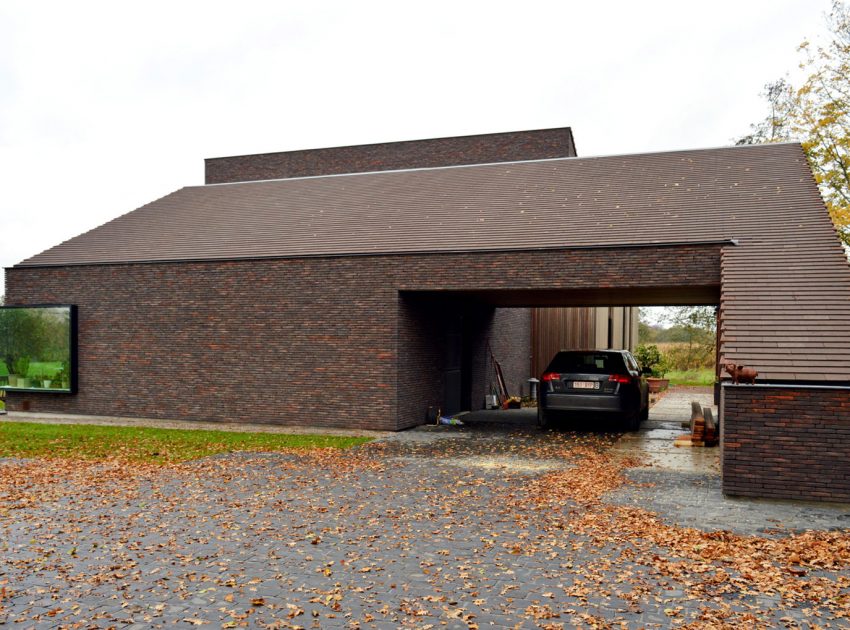 A Luminous House Divided in Two Separate Volumes Surrounded by Vast Green on Aalter, Belgium by Architektuurburo Dirk Hulpia (46)